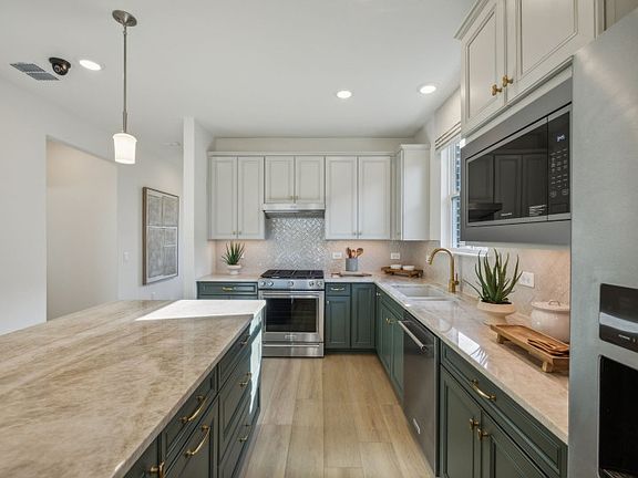 Recessed and pendant lighting in Kitchen