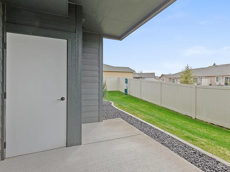 outdoor patio/balcony offers space for a gas grill and outdoor furniture