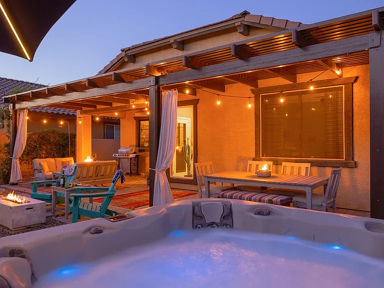 The backyard is an oasis, especially when the stars come out. Enjoy moonlit dinners, stargazing by the fire pit, or soak in the hot tub and look up.