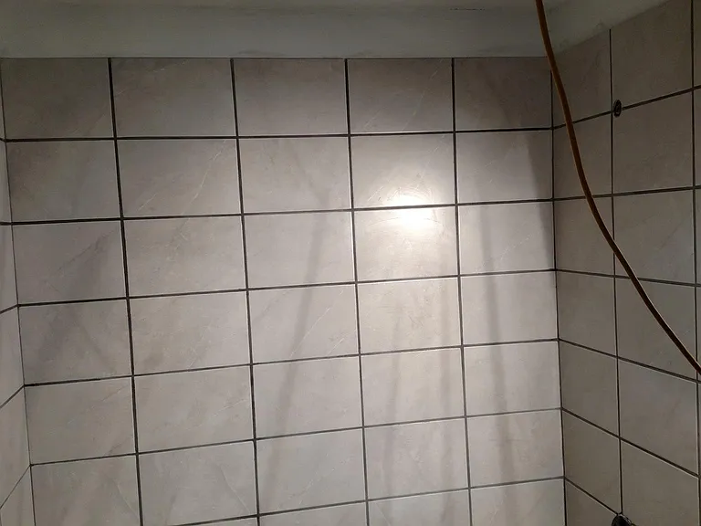 New tiled bath walls.
