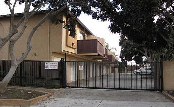 upstairs corner unit with two dedicated parking spots with gated access