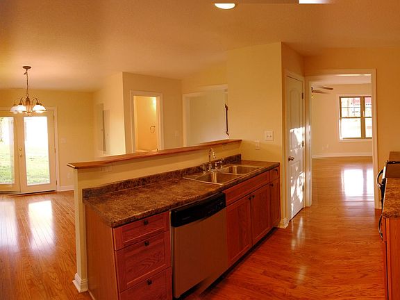 Great floor plan in which the kitchen connects to dining roo