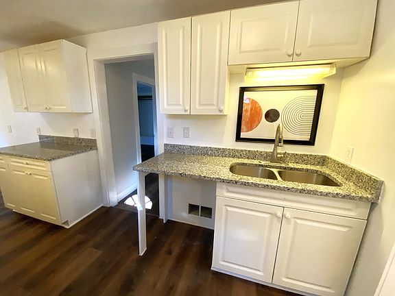 Newly renovated Kitchen with new granite counters and sink.