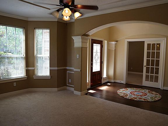 Study with French Doors and Formal Dining with Bay Windows off the Entry.
