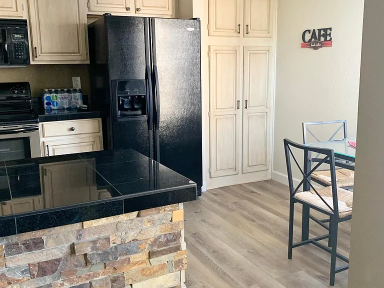 Large kitchen with lots of storage full of all kitchen appliances and utensils.
Keurig, air fryer, crock pot, etc_