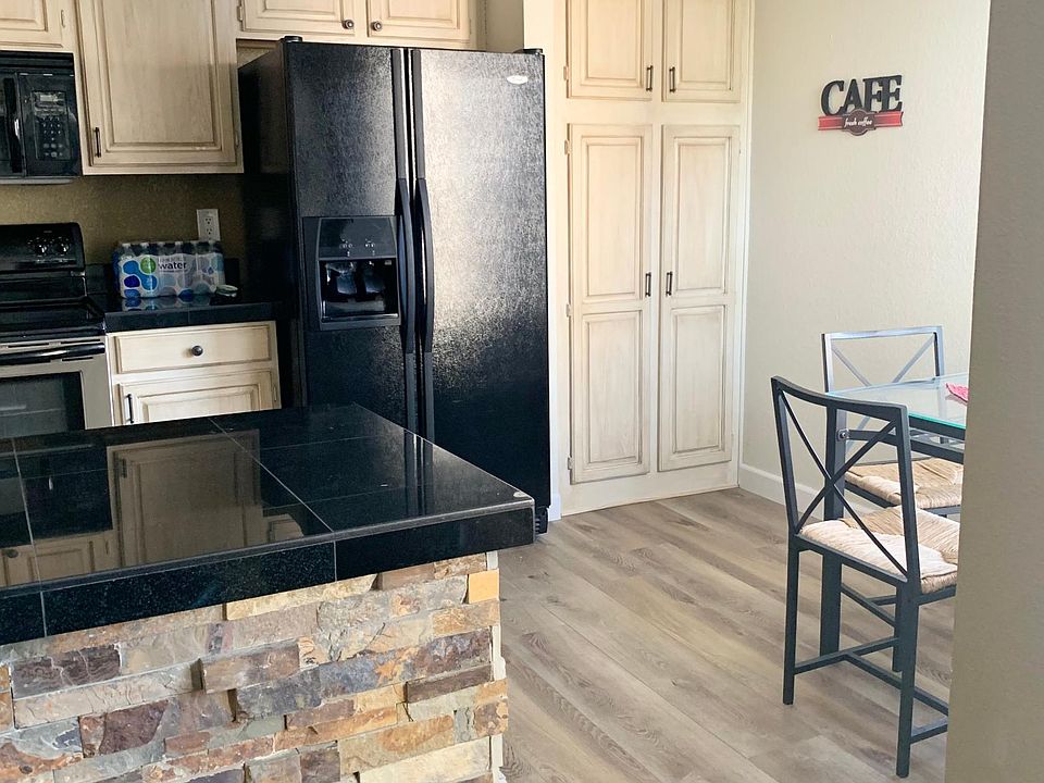 Large kitchen with lots of storage full of all kitchen appliances and utensils. 
Keurig, air fryer, crock pot, etc_