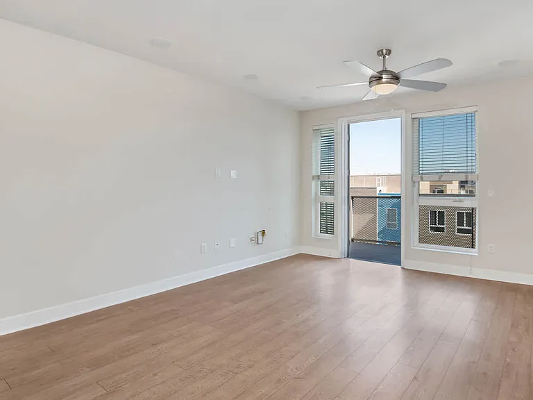 Living Room with Balcony and Hard Surface Flooring