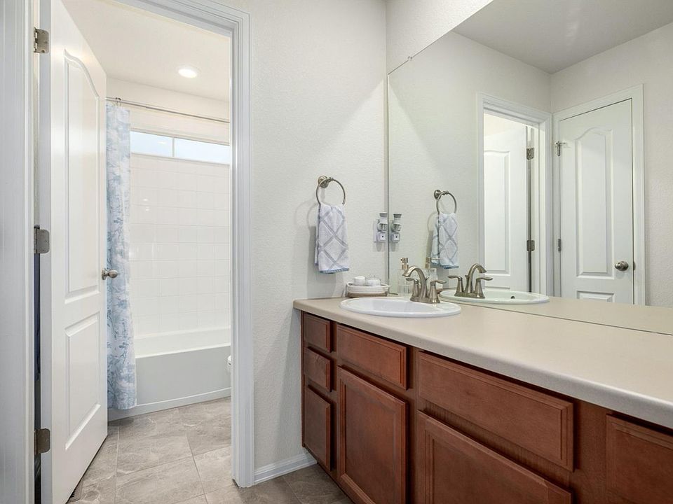 Upper level bathroom with tub