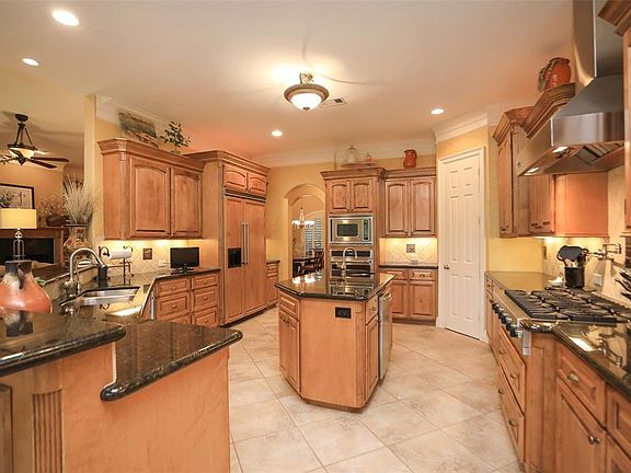 Gourmet kitchen with island! Viking built in refrigerator plus stainless appliances. In 2019-2020 replace Dishwasher and icemaker plus got a New "CafÃ©" oven! Pot Filler plus second vegetable sink on island!