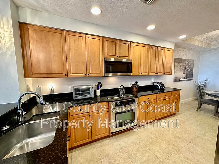 611 Riviera Dunes Way #207 — Photo 2