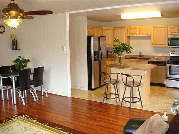 Kitchen totally redone w/ granite counter top, tile flooring,& new appliances