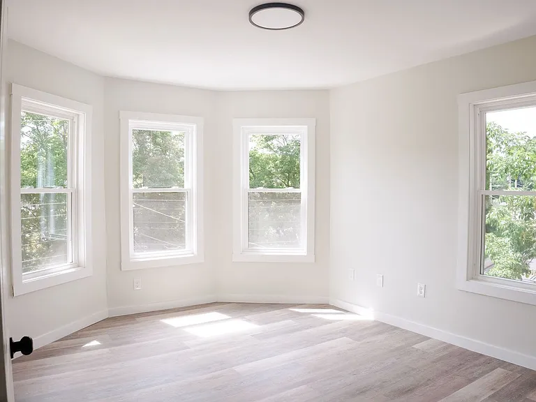 Fully Renovated Apartment Building Modern Upgrades Throughout — Photo 13