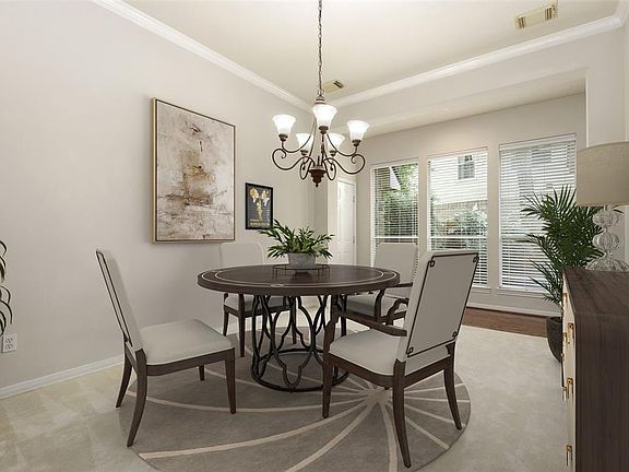 Formal dining room has been virtually staged so you can see the amazing possibilities.
