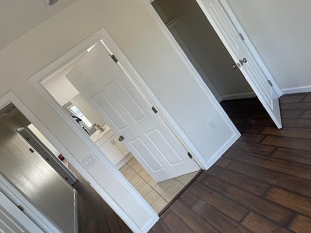 Master bedroom suite with master bathroom and walk in closet