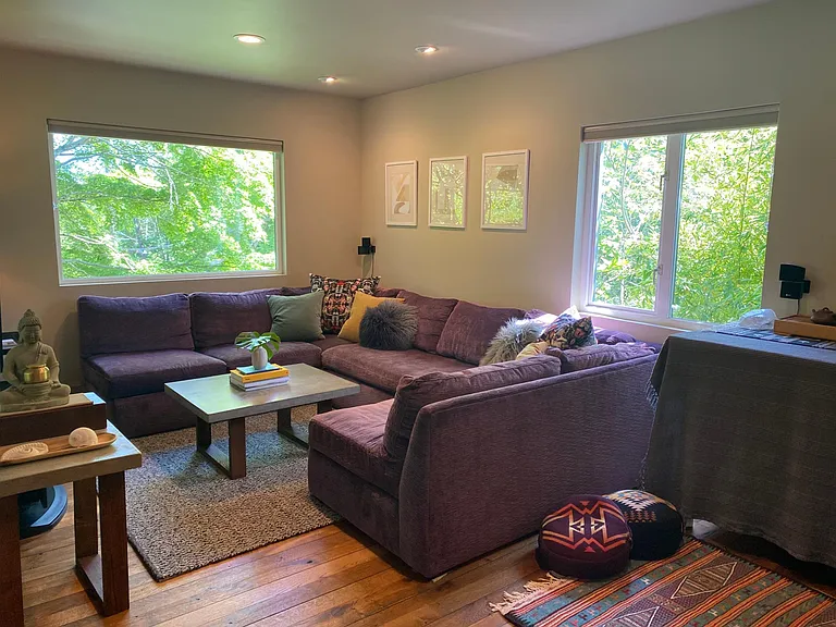 Living room, sw corner. Large picture window features territorial views and large Japanese maple.