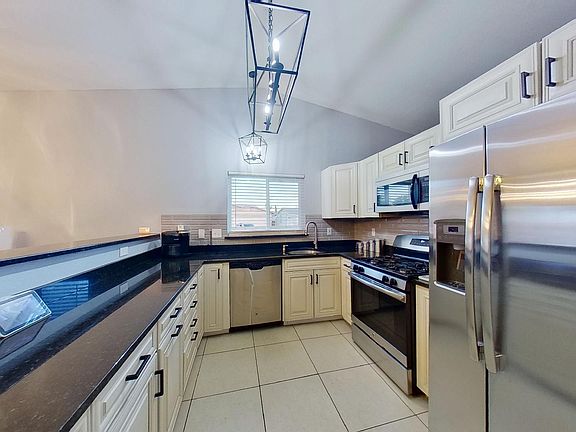 4th image of 7711 S Falster Ave