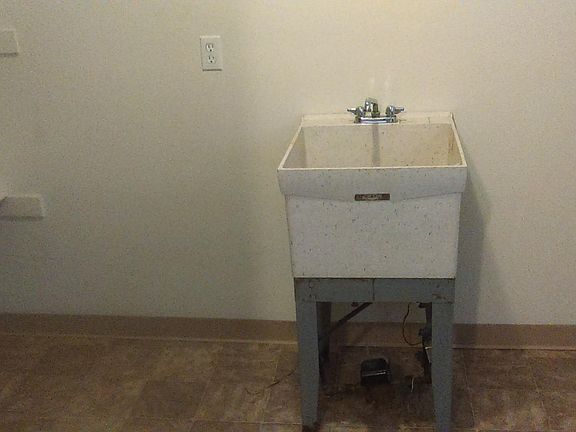 Laundry Room with additional storage off of kitchen. This unit also comes with a washer and dryer.