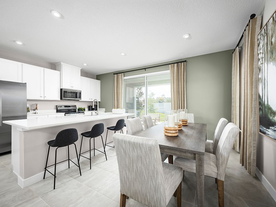 New townhomes in a gated community with lagoon access close to area shopping.