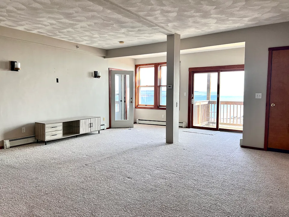 living space wit access to decks and ocean view