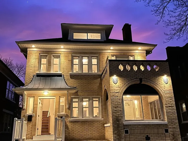 Front of Duplex. Disclaimer: Image is virtually enhanced