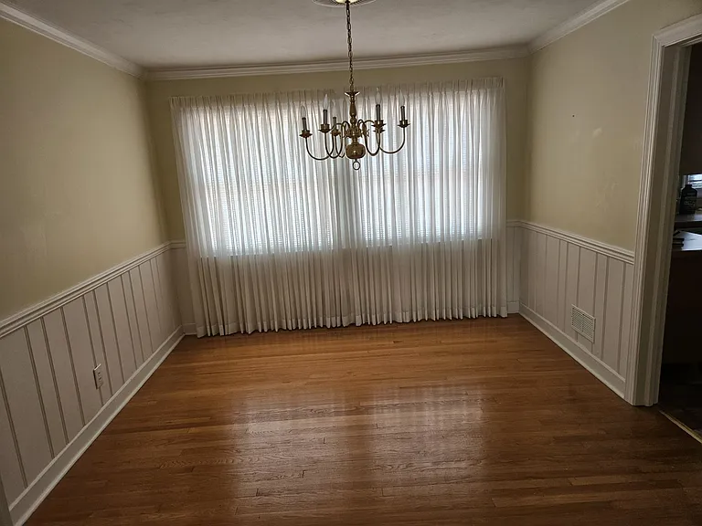 Separate dining area with large window to allow for natural light