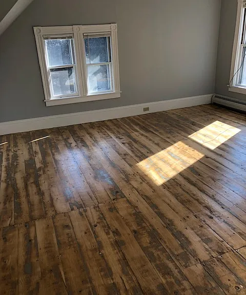 Spacious Bedroom With Hardwood Flooring, Unit Has 3 Closet Spaces Virtually Unheard Of In Victorian Homes