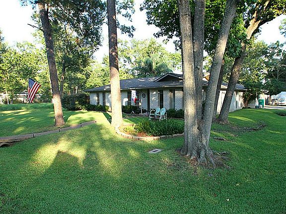 HOME IS LOCATED ON A LARGE CORNER LOT