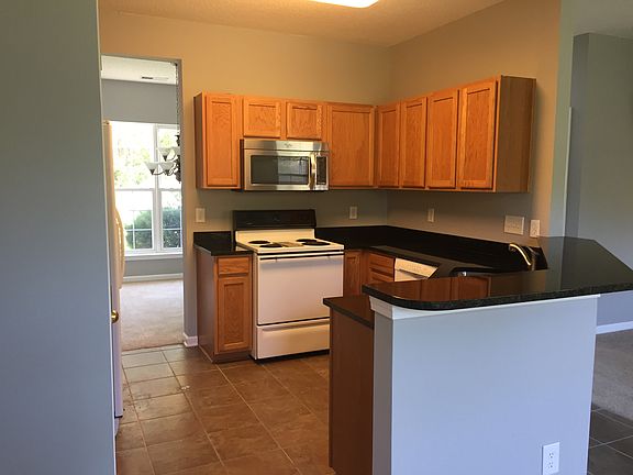 Kitchen opens to Living Room