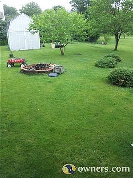 Back yard with 10X12 storage building