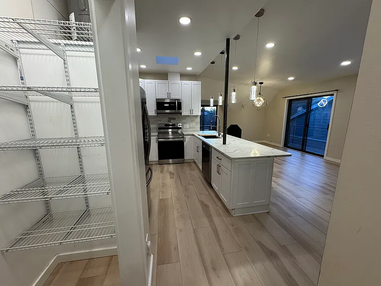 Pantry, kitchen, dining, and living room