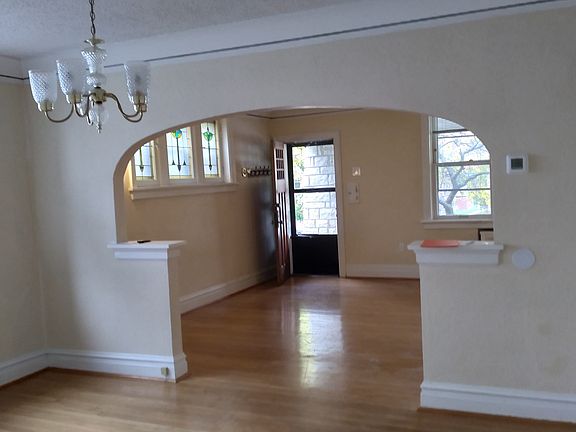 View from dining room into living room and front door