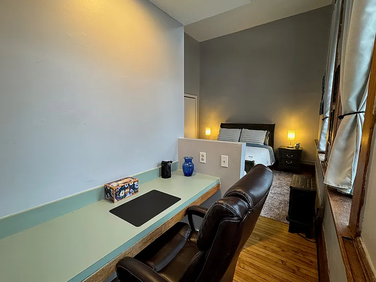 Built in desk secluded, tucked away yet spacious.