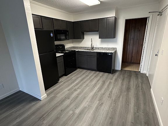 Kitchen w/storage area behind
