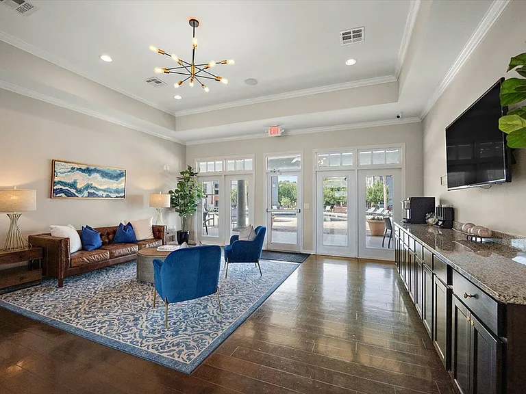 Relax and Socialize in the Stylish Clubhouse Lounge at Eagle Flatts Off-Campus Apartments in Hattiesburg