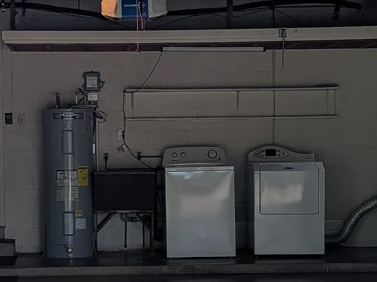 Garage view with washer and dryer