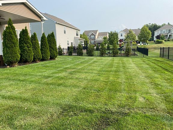 Beautiful fenced in backyard.