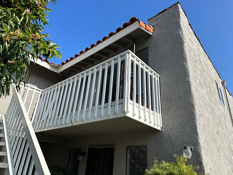 Front balcony of this upstairs 2 bed 2 bath unit
