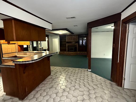 Gorgeous fireplace located center of the home.