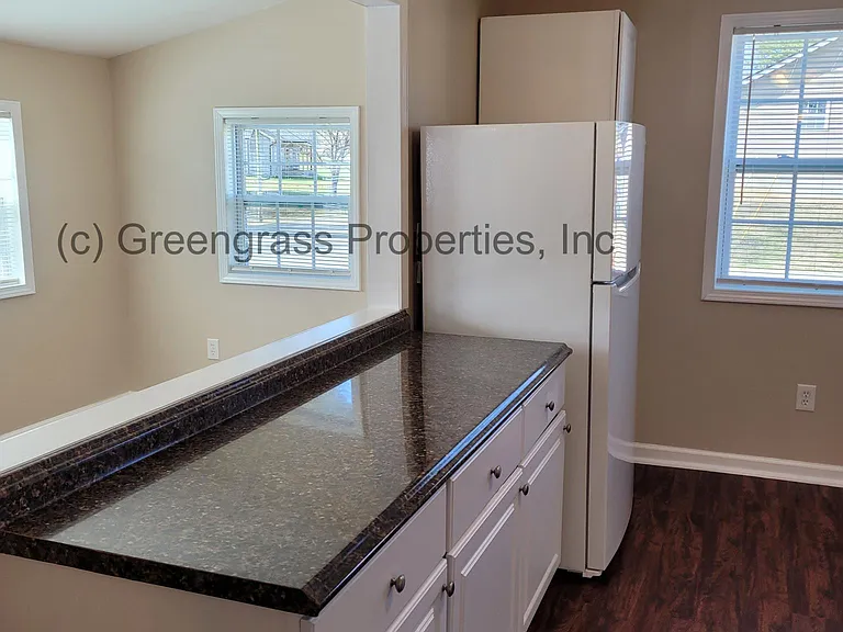 Kitchen island, refrigerator, pantry