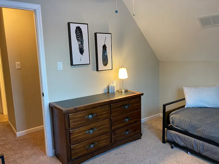 bedroom 2. home does not come furnished. furnishing is for visual reference only.