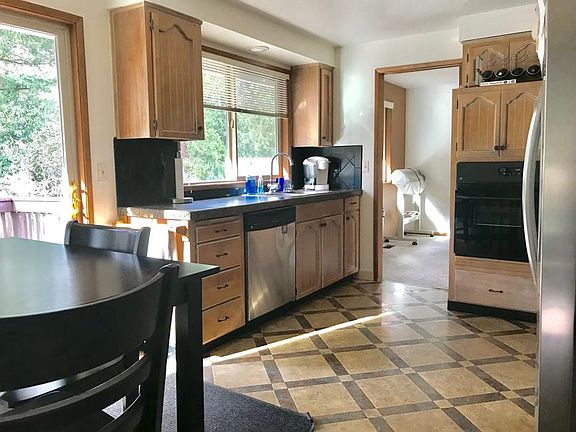 Kitchen with breakfast area, slider to deck, granite counter