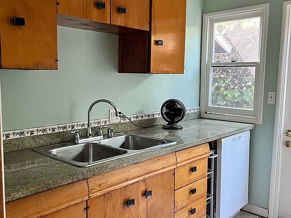 Left side of Kitchen, granite counter tops, new dishwasher