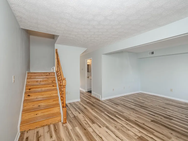 Entrance opens to spacious living room