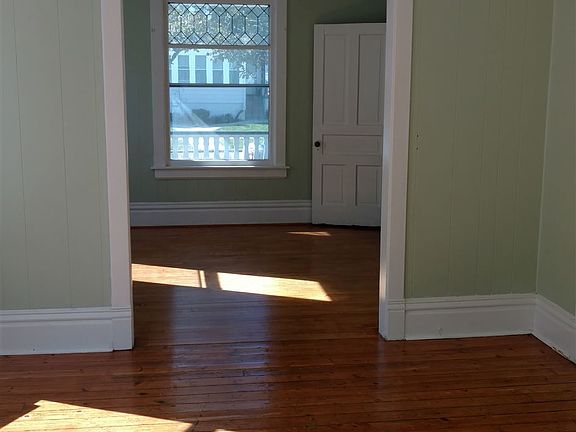 living room (in the back of photo) and dining room