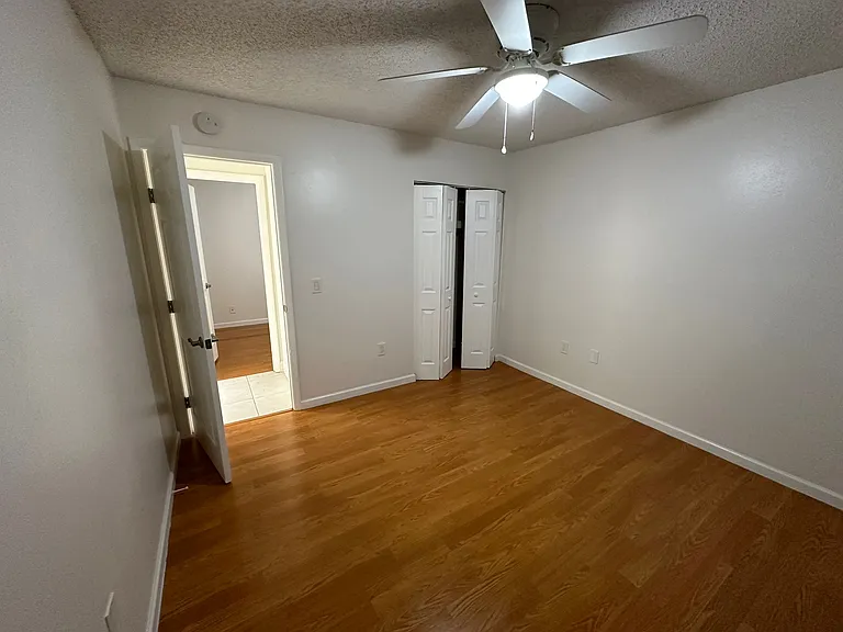 MASTER BEDROOM VIEW FROM SLIDING DOOR.