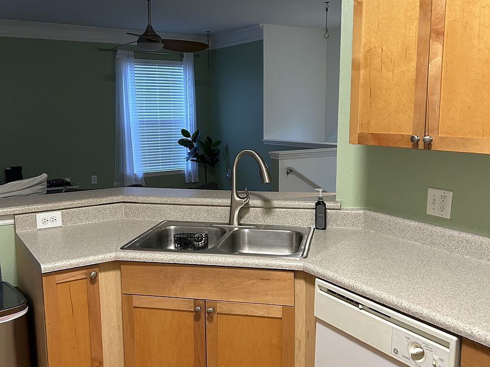 Kitchen overlooking living room.