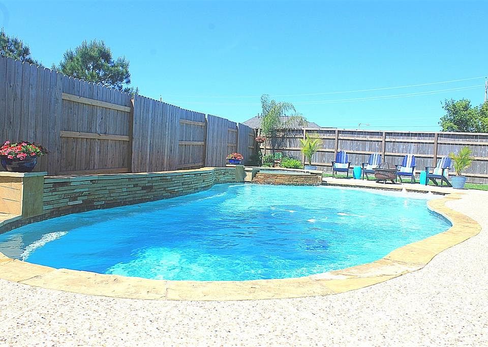 Welcome to 525 Burham Ln in Westover Park. This backyard oasis is waiting for you! No back neighbors, heated pool and hot tub with LED lights, tanning ledge with bubblers, covered patio with built in grill and refrigerator and plenty of lawn area!