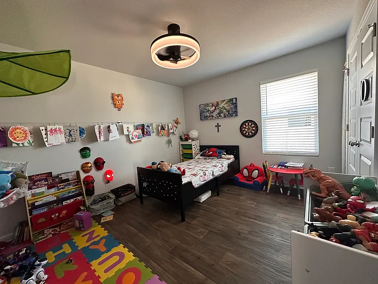 Room #1 with ceiling fan.