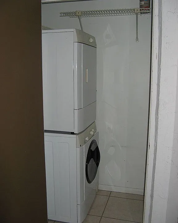 Laundry and machines in unit