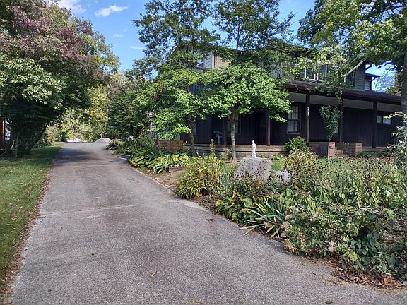 Driveway to back of property. Entire lot is about .4 acres.